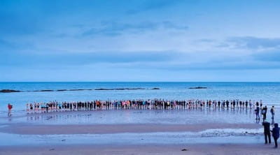 Swimmers stand united at the shores of Lossiemouth